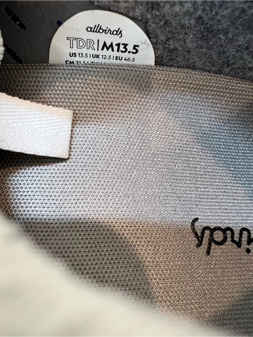 allbirds Men's US 13,5 Slip-On Knit Sneakers - White and navy.